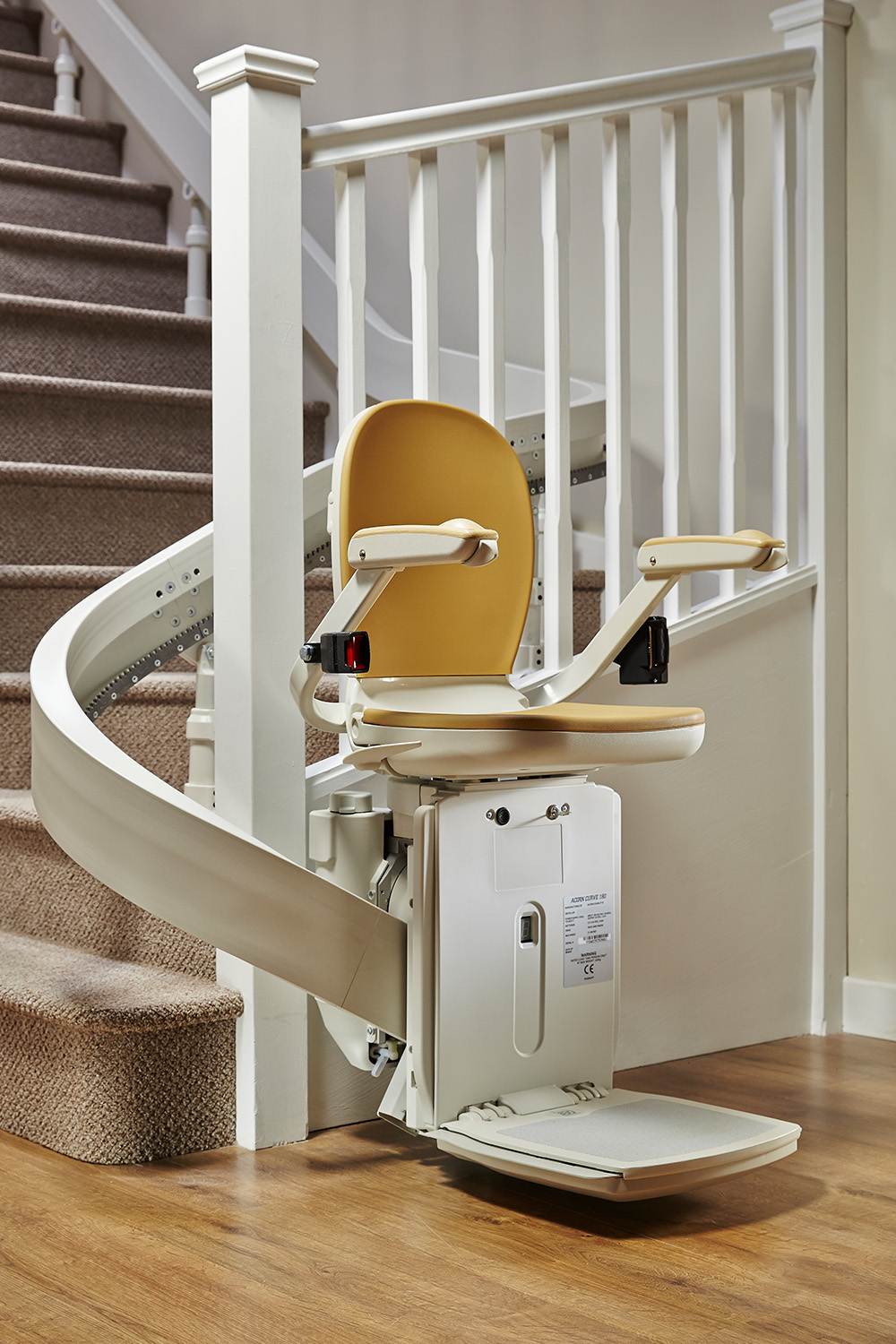 Curved stairlift installed on a turning staircase